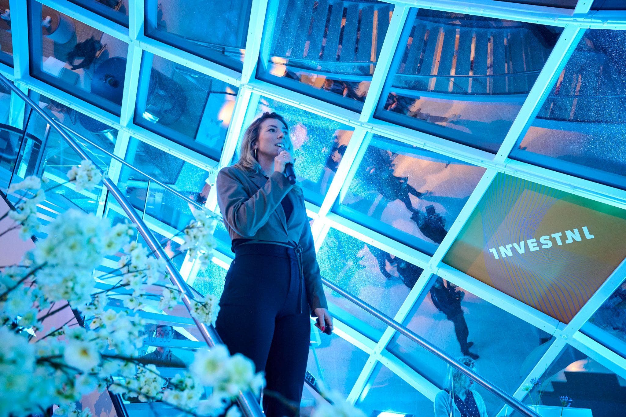 Maxime on stage at InvestNL event